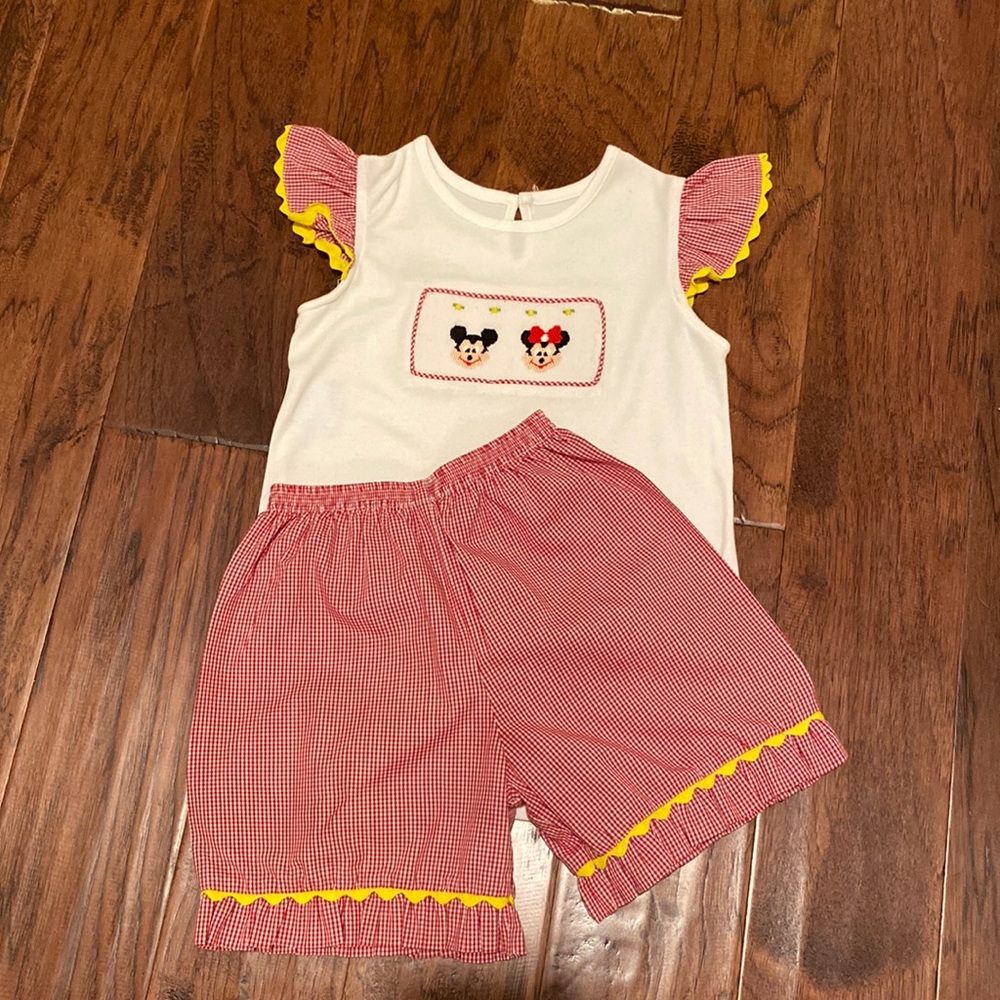 Mickey and Minnie smocked shorts set.   Girls size 7.  Red gingham shorts